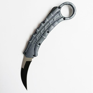 Chinese Wholesale Carbon Fiber Coated Dinosaur Bone Otf Auto Karambit Knife